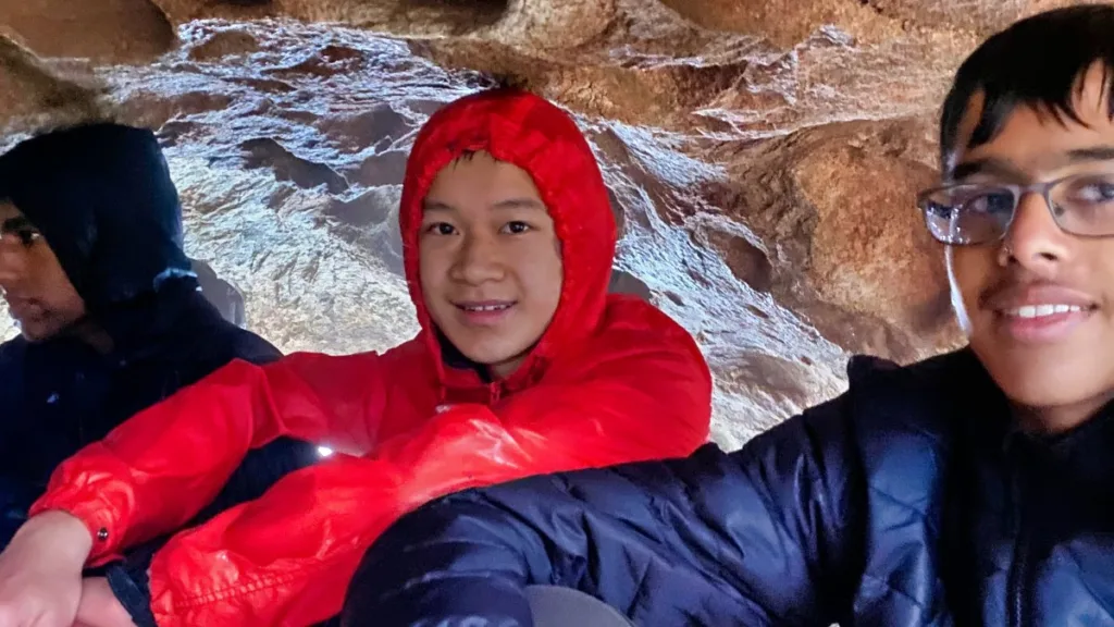 Santi in a cave during a 3 day teen hike with LifeTrail