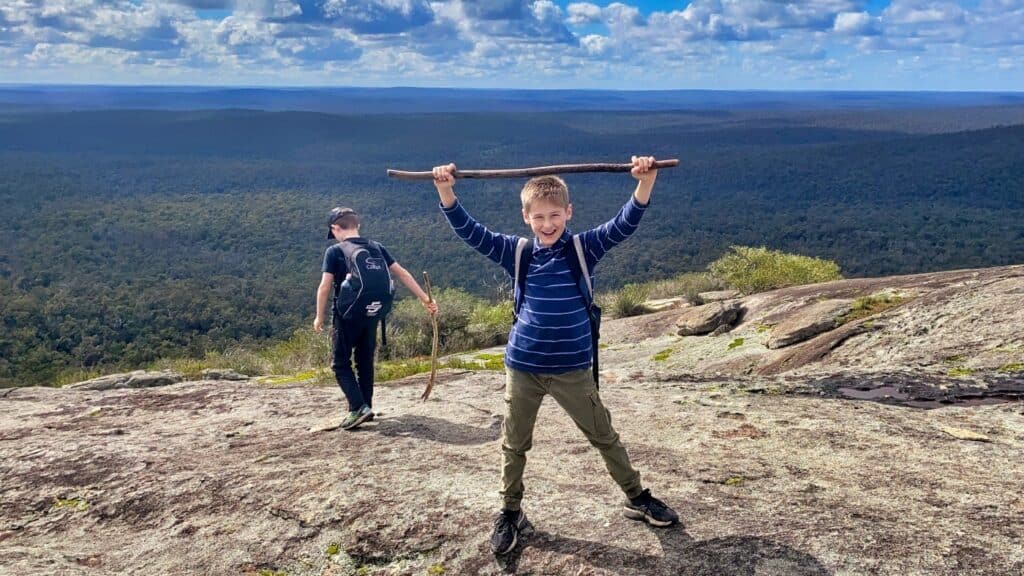 two young boys during a day hike on Mt Cuthbert, Bibbulmun Track with LifeTrail