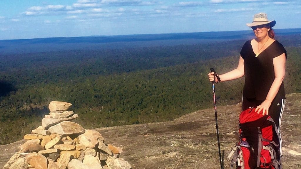 lady on mt cuthbert with her large backpack