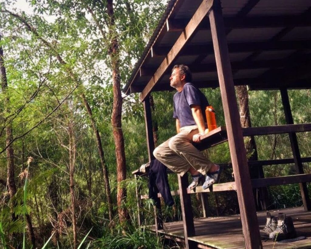 Didier resting at a Bibbulmun Track campsite open hut