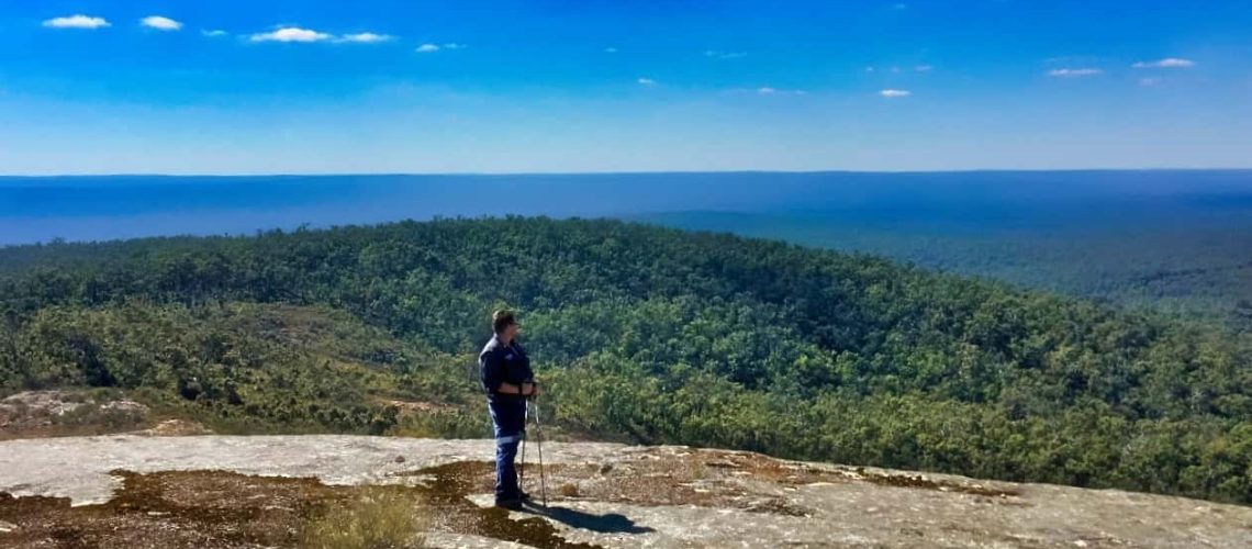 man hiking alone